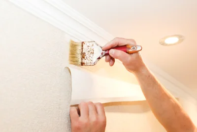 Pose de papier peint au Grès — revêtements muraux et toiles de verre